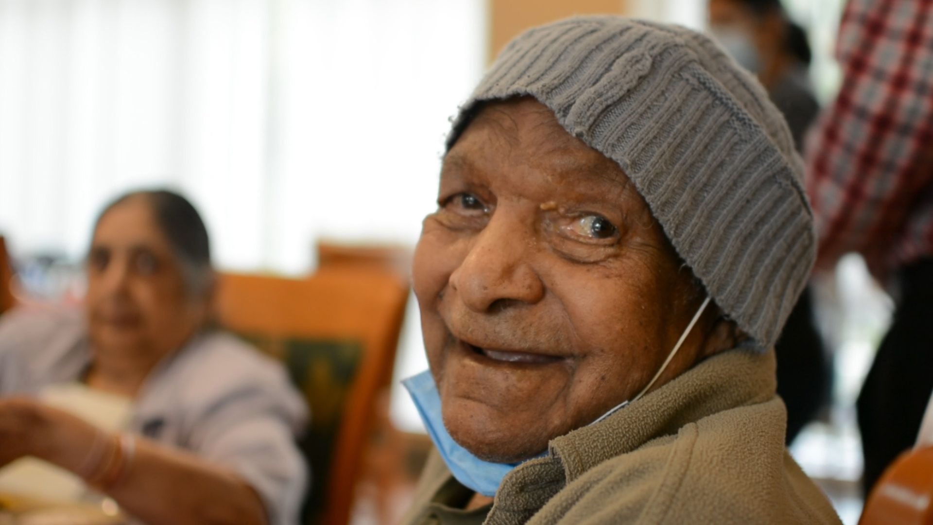 Adult day South asian female smiling